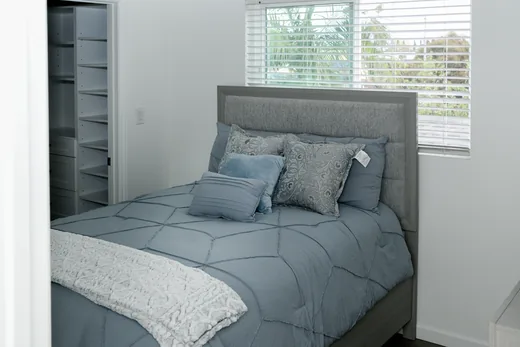 Second bedroom with a window and built-in storage